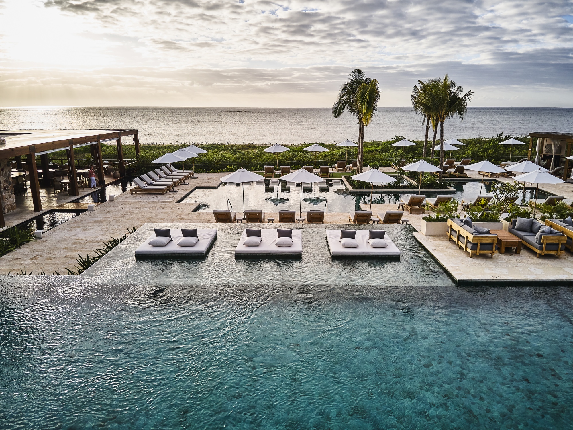 Fashion meets paradise: The Ultimate beach clubs to experience luxury and  style this summer