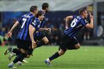 Inter Milan players celebrate during a match at Giuseppe Meazza Stadium in Milan on May 6. 