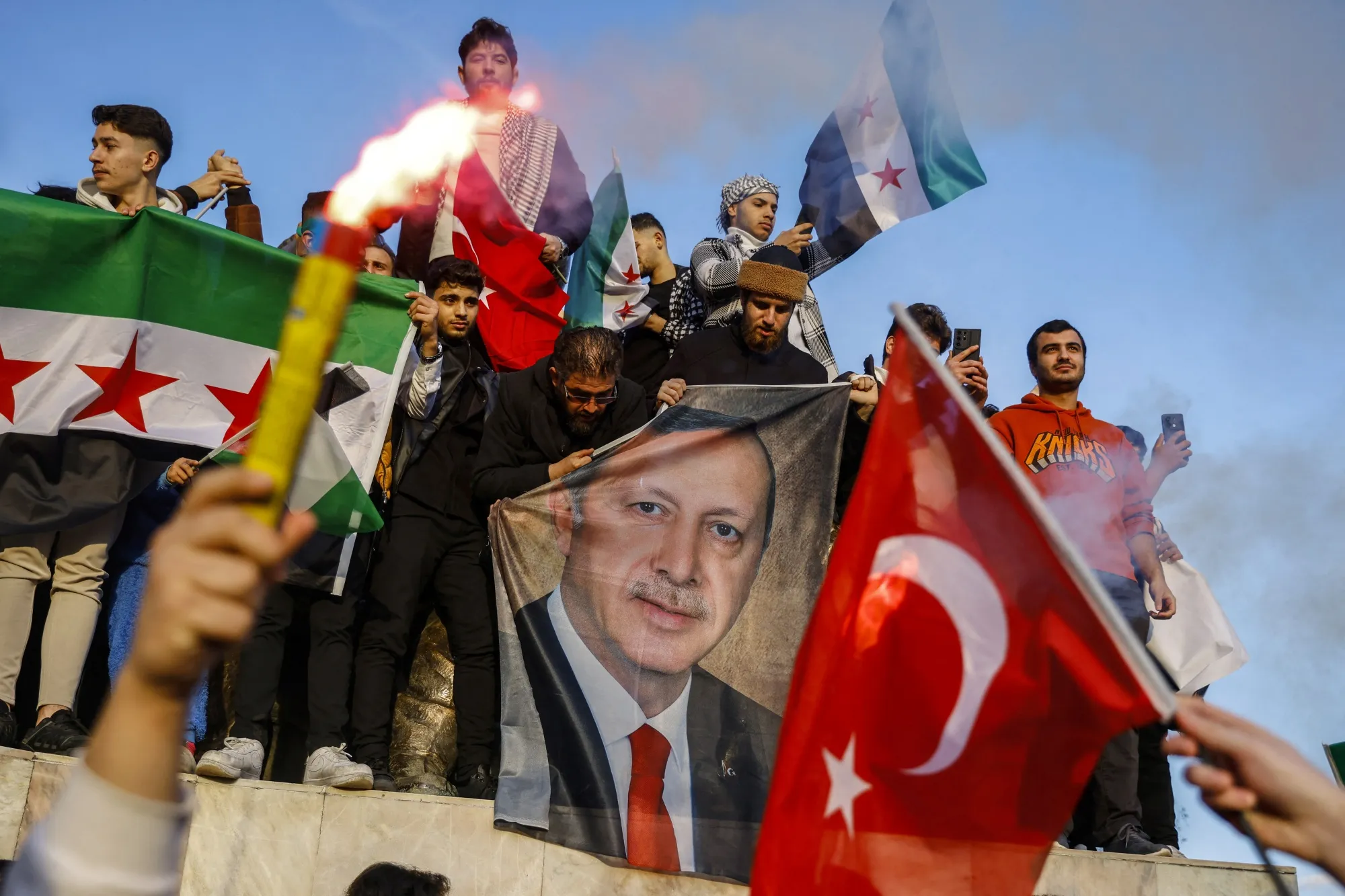 Members of the Syrian community in Istanbul’s Fatih district celebrate the fall of Syrian President Bashar al-Assad.