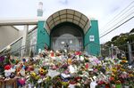 Flowers cover the steps of the Kilbirnie Mosque on March 17.