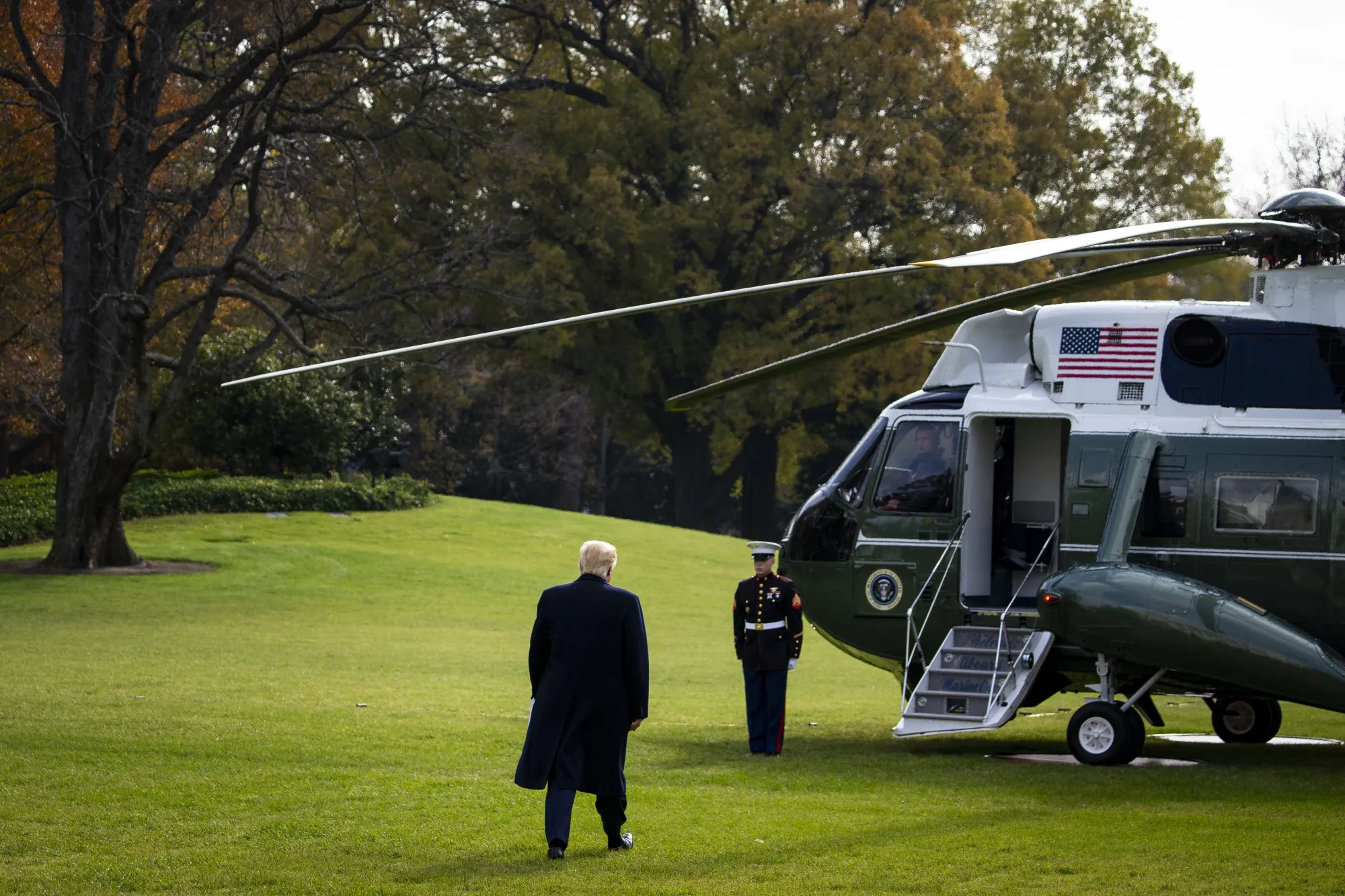Donald Trump walks to board Marine One on the South Lawn of the White House in Washington, D.C.