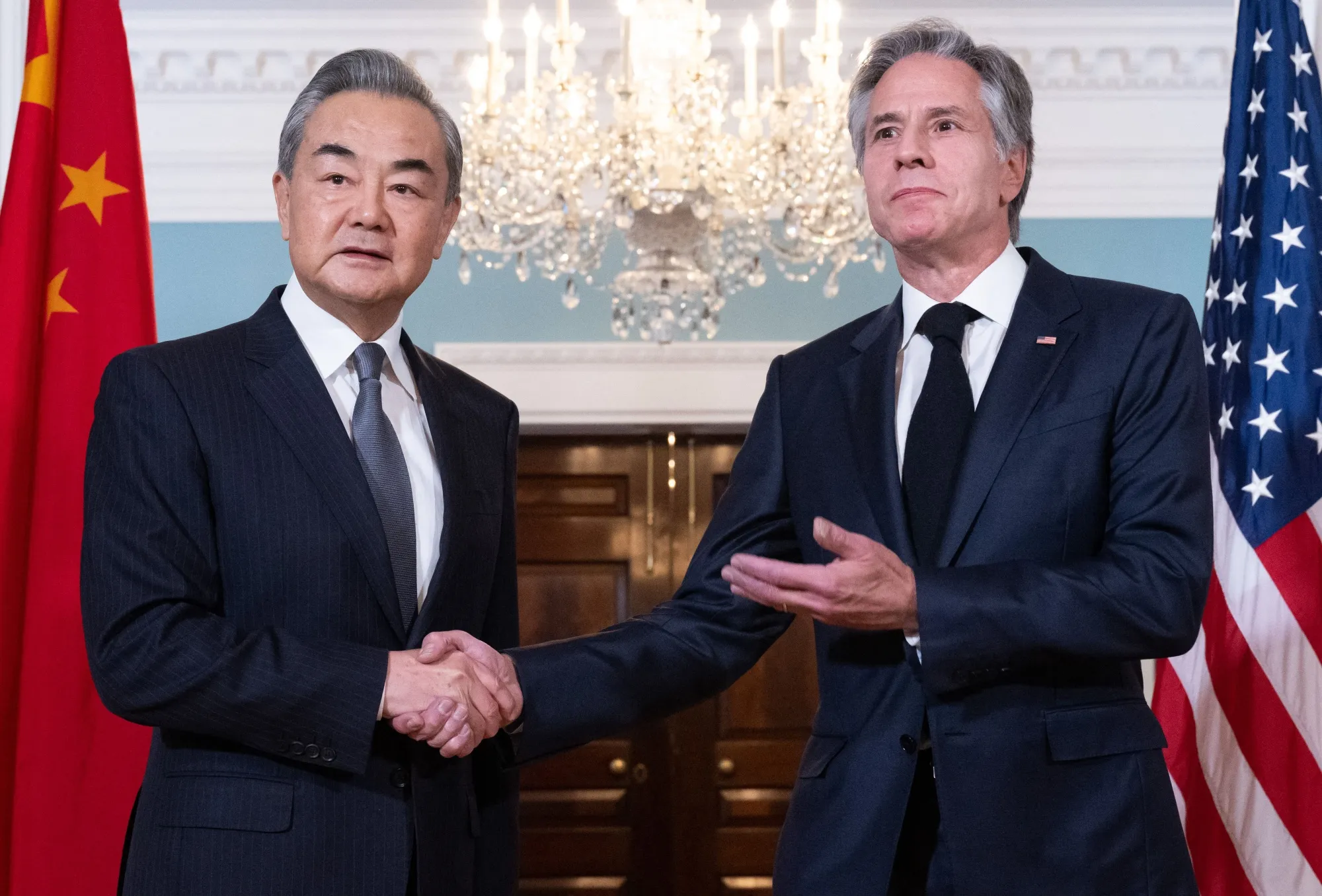 Wang Yi, left, with Antony Blinken in Washington, DC, on Oct. 26.