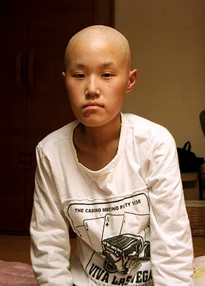 Hwang Yu-mi at home, a few months before her death from leukemia on March 6, 2007