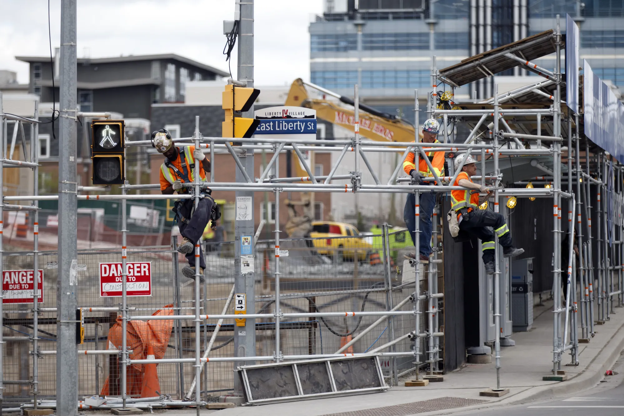 Scaffolding goes up around the site of a condo development in Toronto.