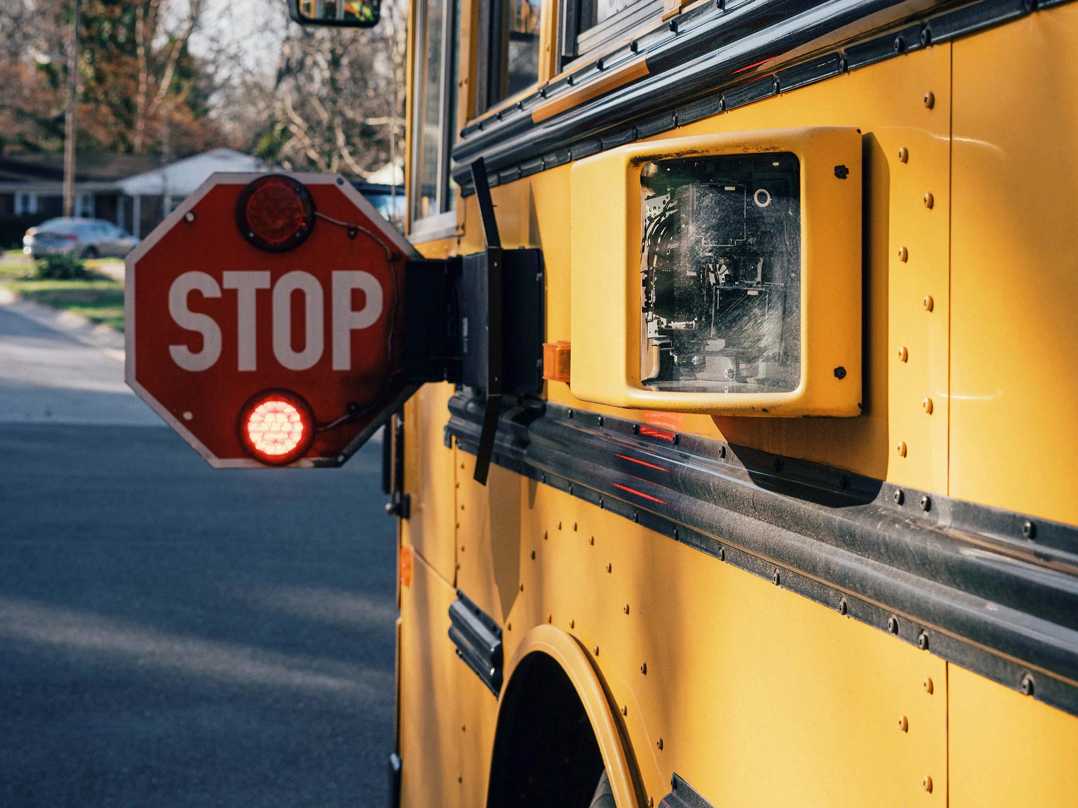 A Montgomery County school bus deploys BusPatrol’s technology while picking up children in Silver Spring, Maryland, on March 24.