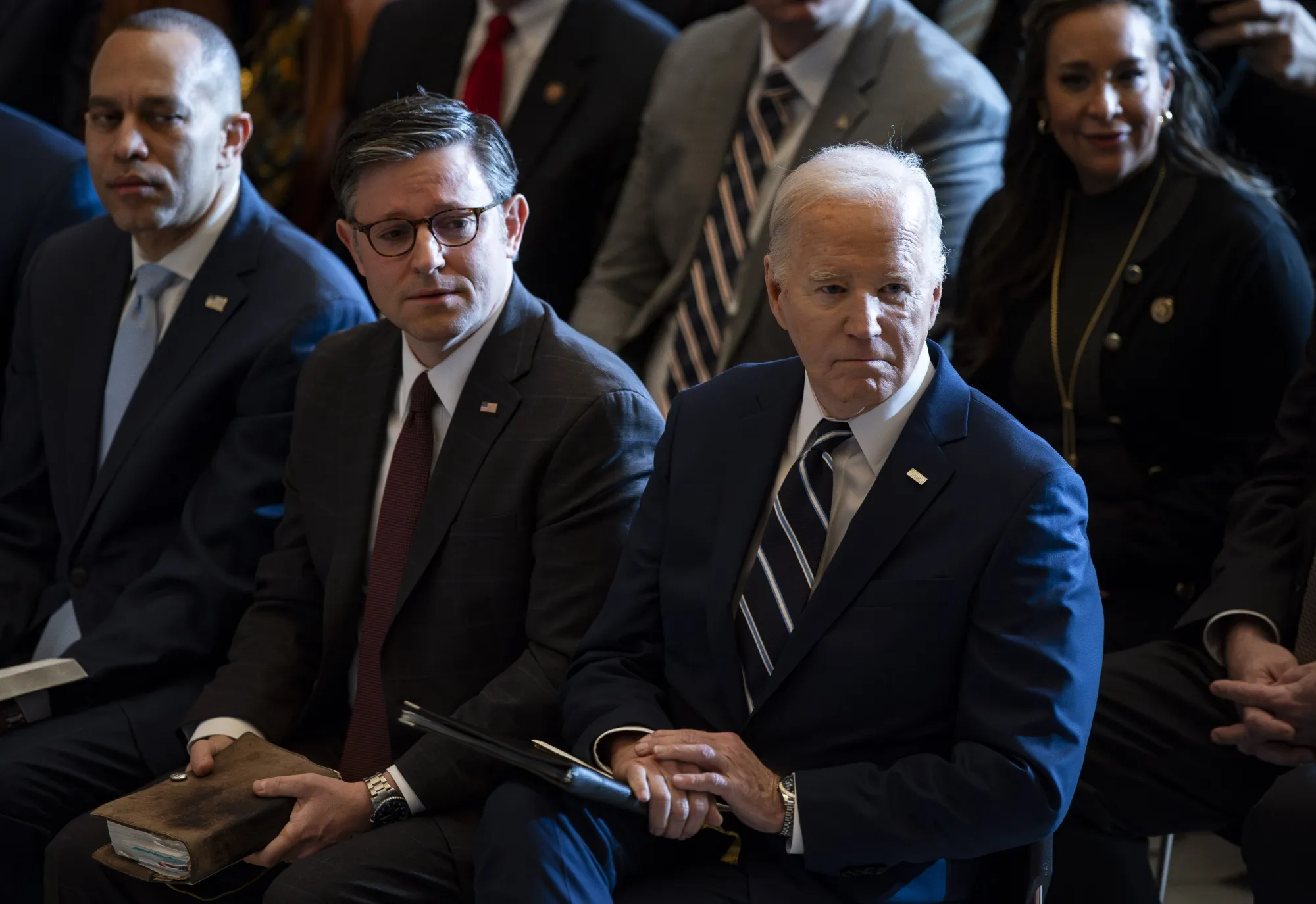 Mike Johnson and Joe Biden.