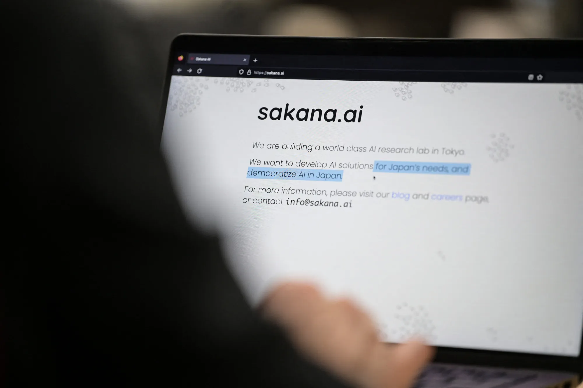 The website of Japanese start-up tech firm Sakana AI, at an office in Tokyo.