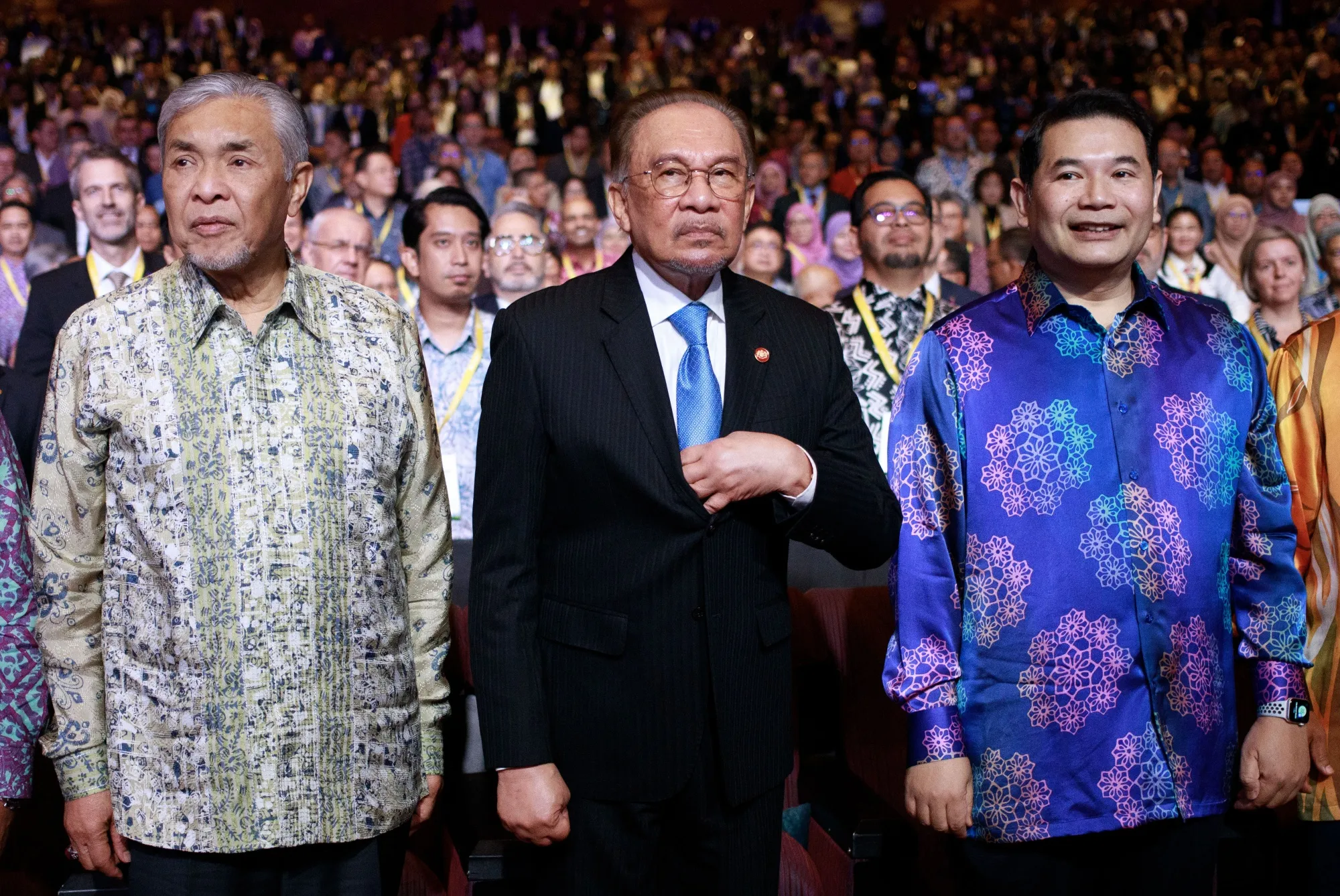Ahmad Zahid Hamidi, president of the United Malays National Organization (UMNO), from left, Anwar Ibrahim, Malaysia's prime minister, and Rafizi Ramli, Malaysia's economy minister, at the Malaysia Economic Forum 2025 in Kuala Lumpur, Malaysia, in January 2025.