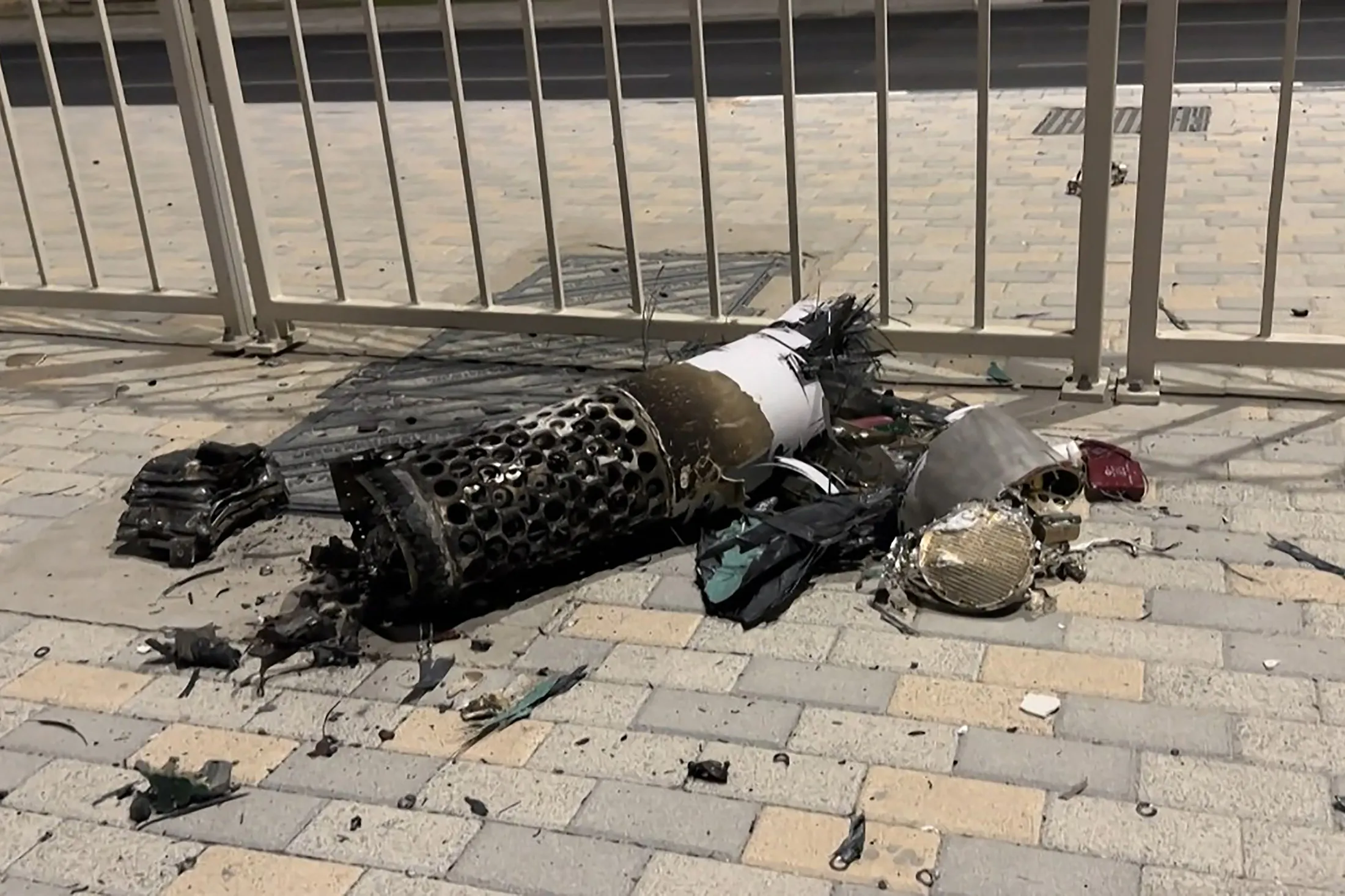 A frame grab take from AFPTV footage shows the remnants of an Iranian missile intercepted over Qatar on June 23.