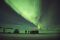 Tourists photograph the Northern Lights at lake Thingvellir, Iceland on January 13, 2016.An island of ice and lava battered by the Arctic winds, Iceland's dramatic and pristine landscape is attracting a growing number of tourists, not all of whom are respectful of the fragile ecosystem. / AFP / Halldor KOLBEINS (Photo credit should read HALLDOR KOLBEINS/AFP/Getty Images)