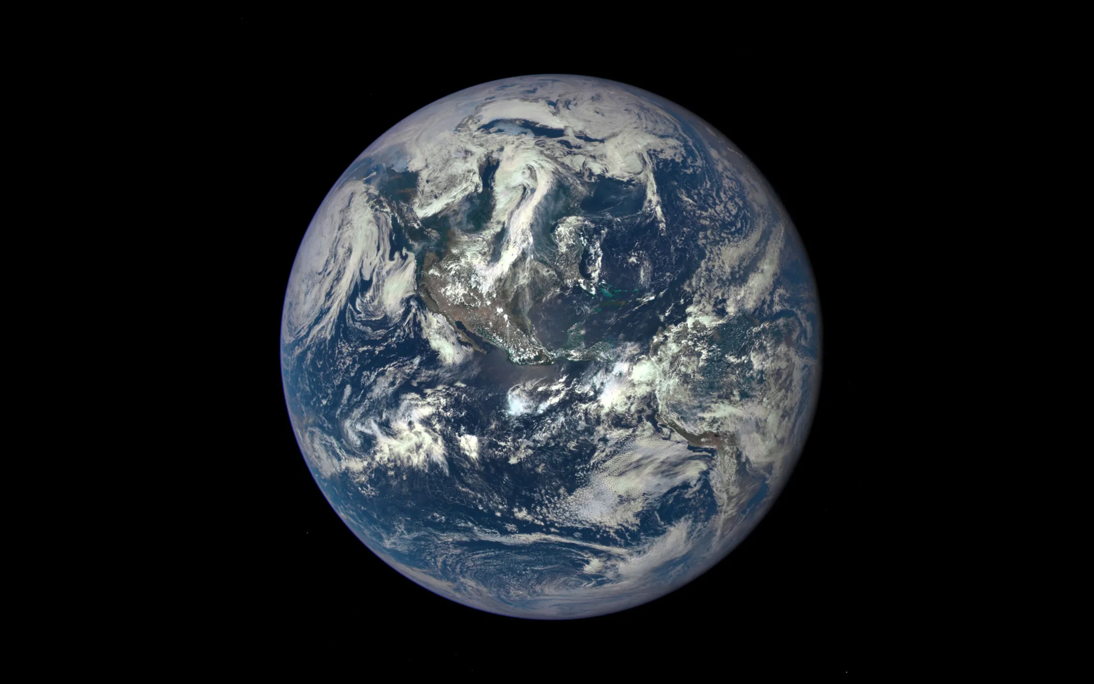 The first image of Earth released by NASA's Deep Space Climate Observatory, whose camera, a million miles away, will send home new photos every day.
