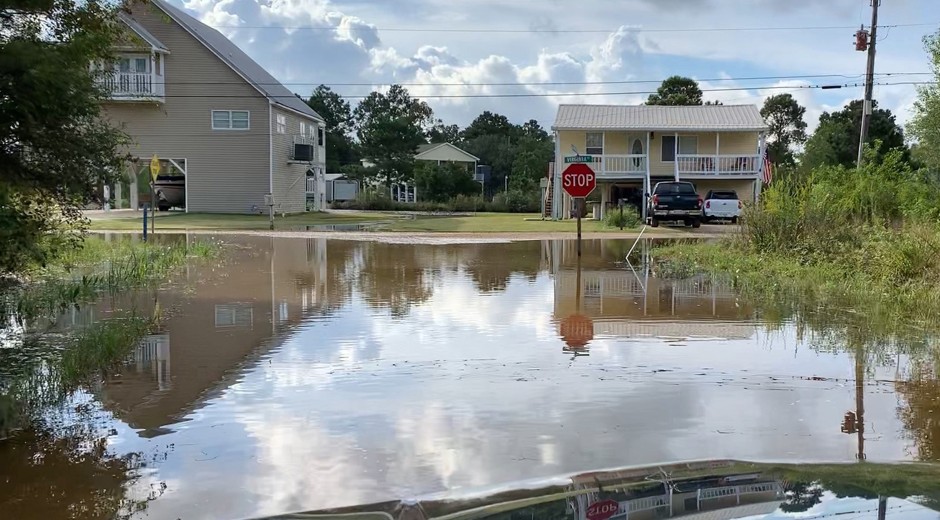 It's not just hurricanes and storms. Even a stray breeze off the Gulf of Mexico can submerge roads on a sunny day like this one in Bay St. Louis.