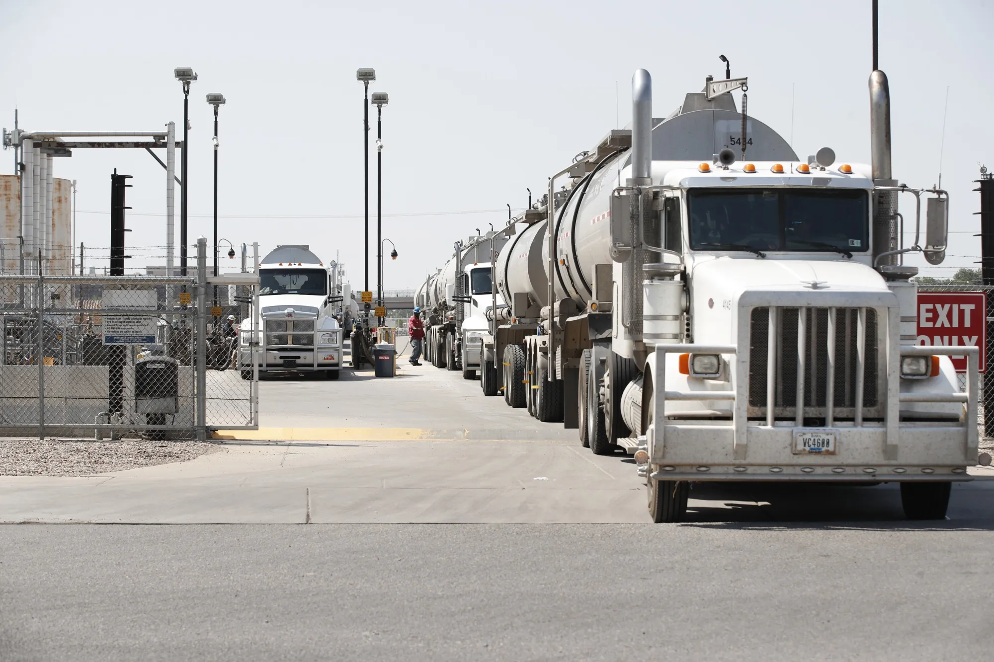 Raw crude oil is off-loaded from tanker trucks to be refined into gasoline at a Marathon Petroleum oil refinery&nbsp;in Salt Lake City, Utah.