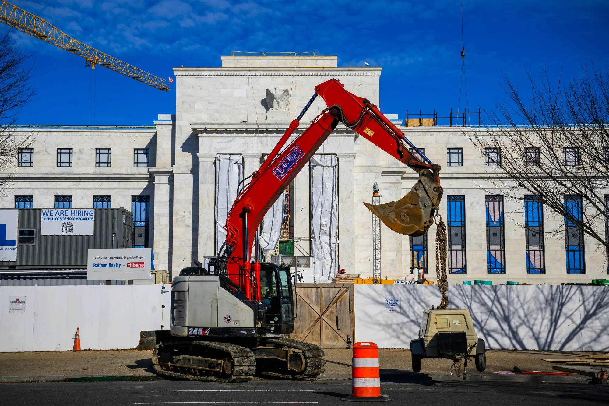 An excavator as construction continues on the Marriner S. Eccles Federal Reserve building in Washington.