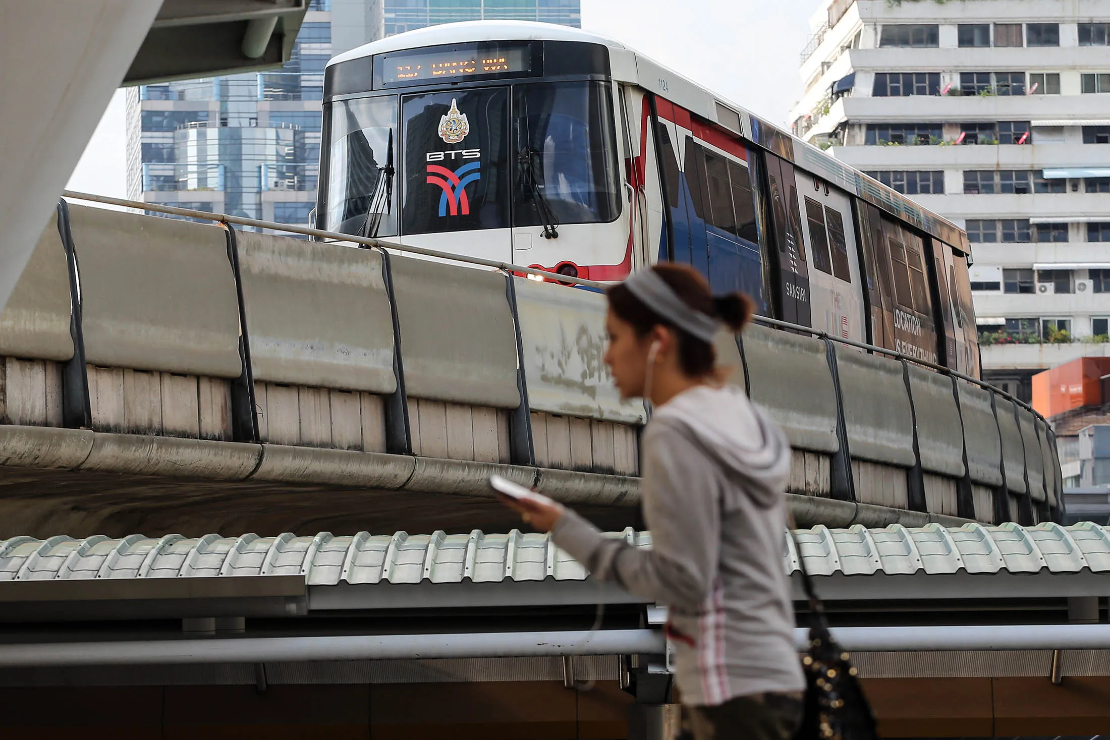 A sky train operated by Bangkok Mass Transit System Pcl, a unit of BTS Group Holdings Pcl, travels on an elevated track above Chong Nonsi intersection in central Bangkok, Thailand, on Wednesday, Oct. 14,. 2015.
