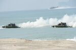 :US marines amphibious assault vehicles prepare to hit the beach during the amphibious assault simulation by Philippine and US marines of 31st Marine Expeditionary Unit based in Okinawa Japan.
