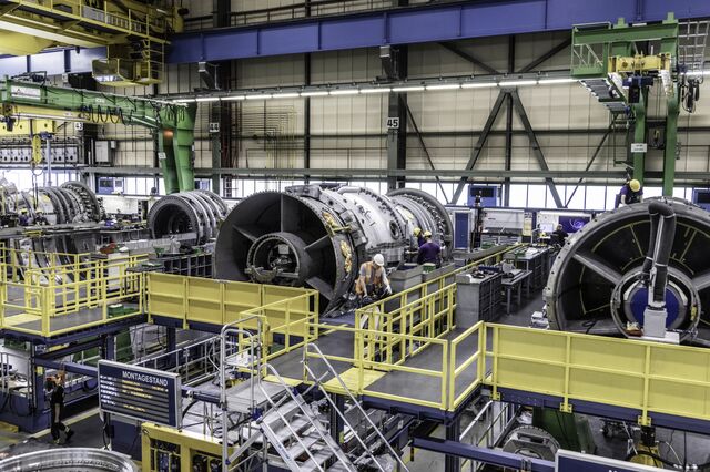 The assembly of the outer casing of a gas turbine at the Siemens Energy plant. The rapid growth in demand for gas turbines has created a bottleneck and sent these three giants' stock prices soaring.