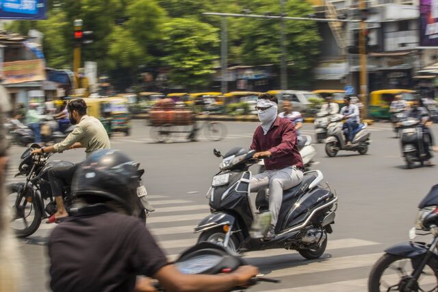 Traffic is seen at a junction in Ahemdabad, Gujarat, India, on Friday, May 5, 2023. Photographer: Prashanth Vishwanathan/Bloomberg
