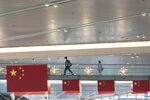 Chinese flags at Shanghai Hongqiao International Airport ahead of the Golden Week holiday on Sept. 30