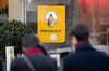 A sign sits outside the Renault SA flagship store on the Champs Elysee in Paris, France.