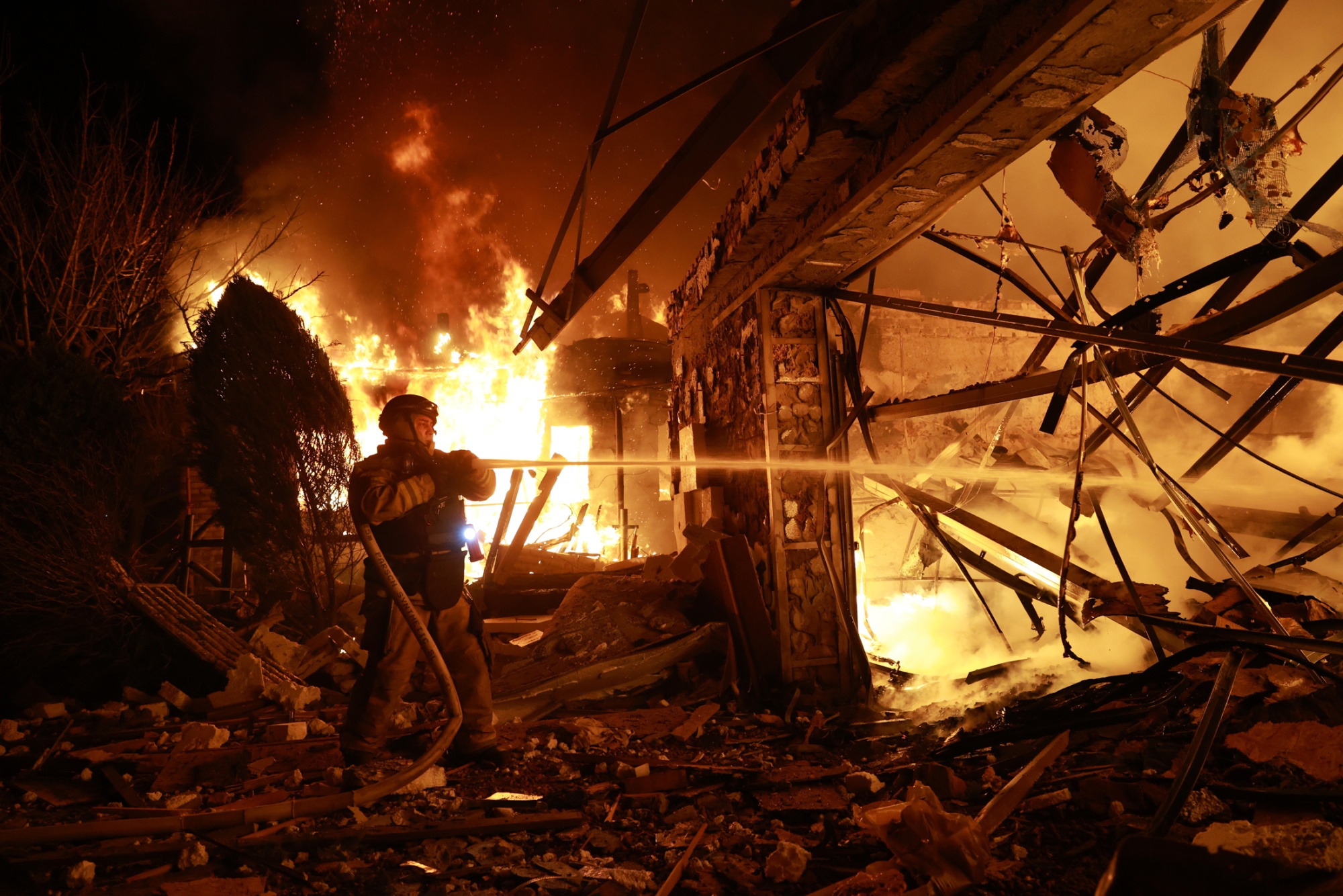 Firefighters tackle a blaze following a Russian drone attack in Zaporizhzhia, Ukraine, in March. Photographer: Kateryna Klochko/AP Photo