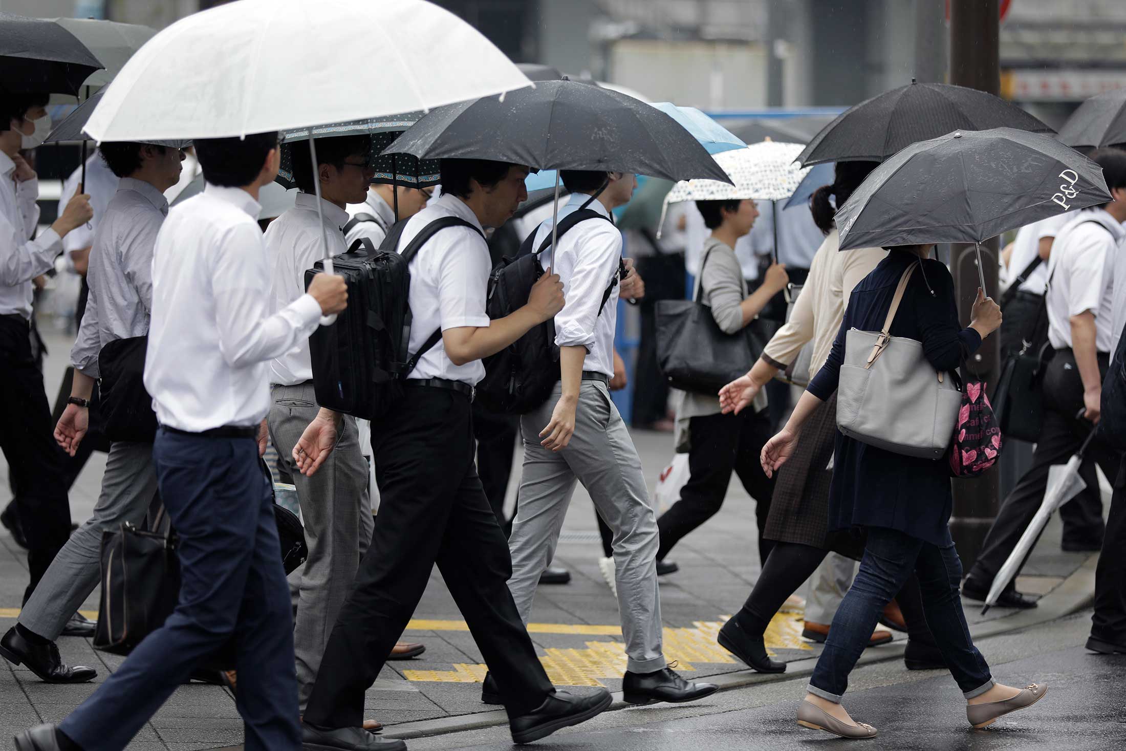 Japan Wants Its Overworked Citizens to Start Weekends Early Bloomberg