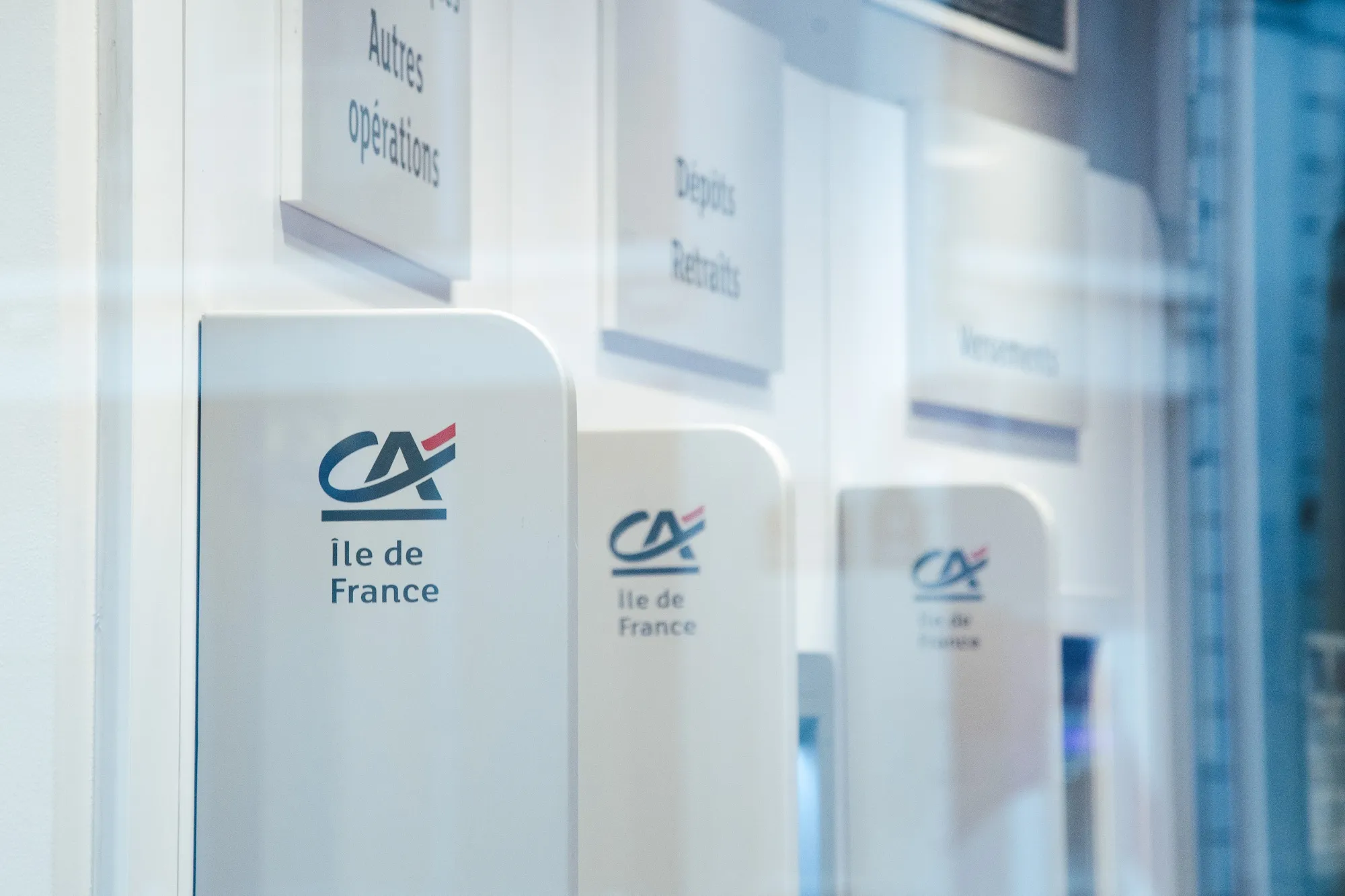 ATMs at a Credit Agricole bank branch in Paris.