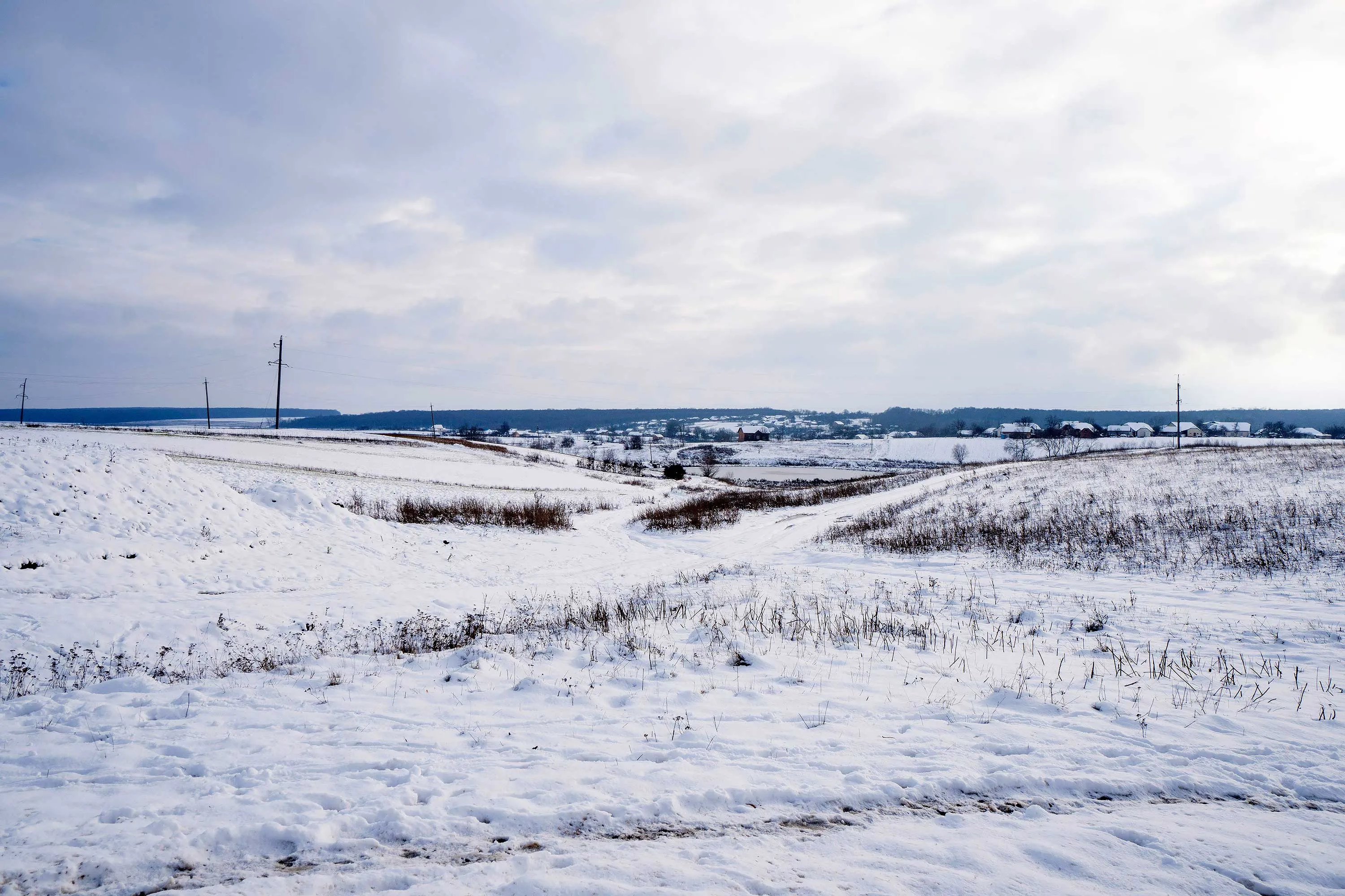 Snow covers agricultural land near Ternopil, Ukraine.