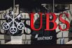 The UBS and Credit Suisse logos.