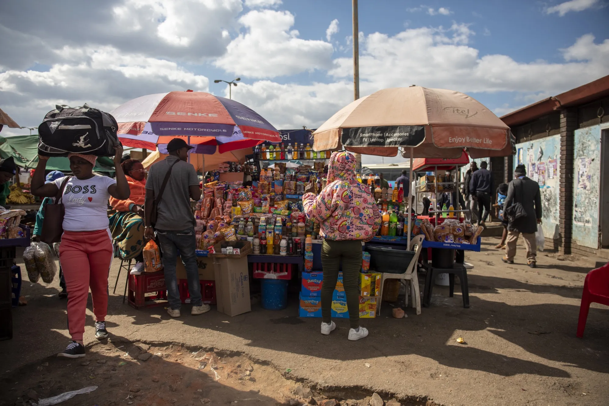 Street vendors and customers in the central business district of Harare.&nbsp;