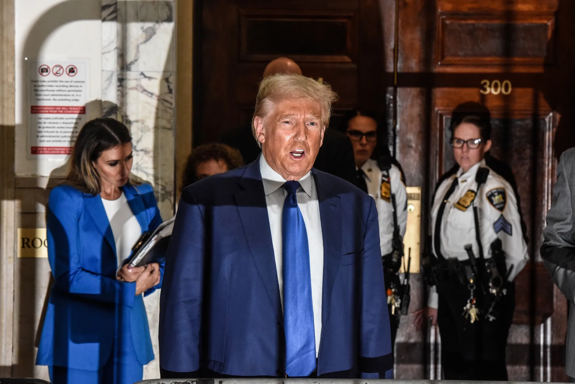Former President Trump speaks to members of the media at New York State Supreme Court in New York on Oct. 25.