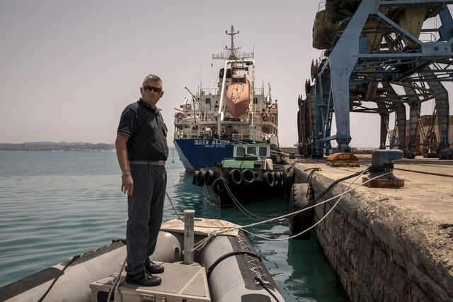 An agent next to the Queen Majeda at the port of Durres