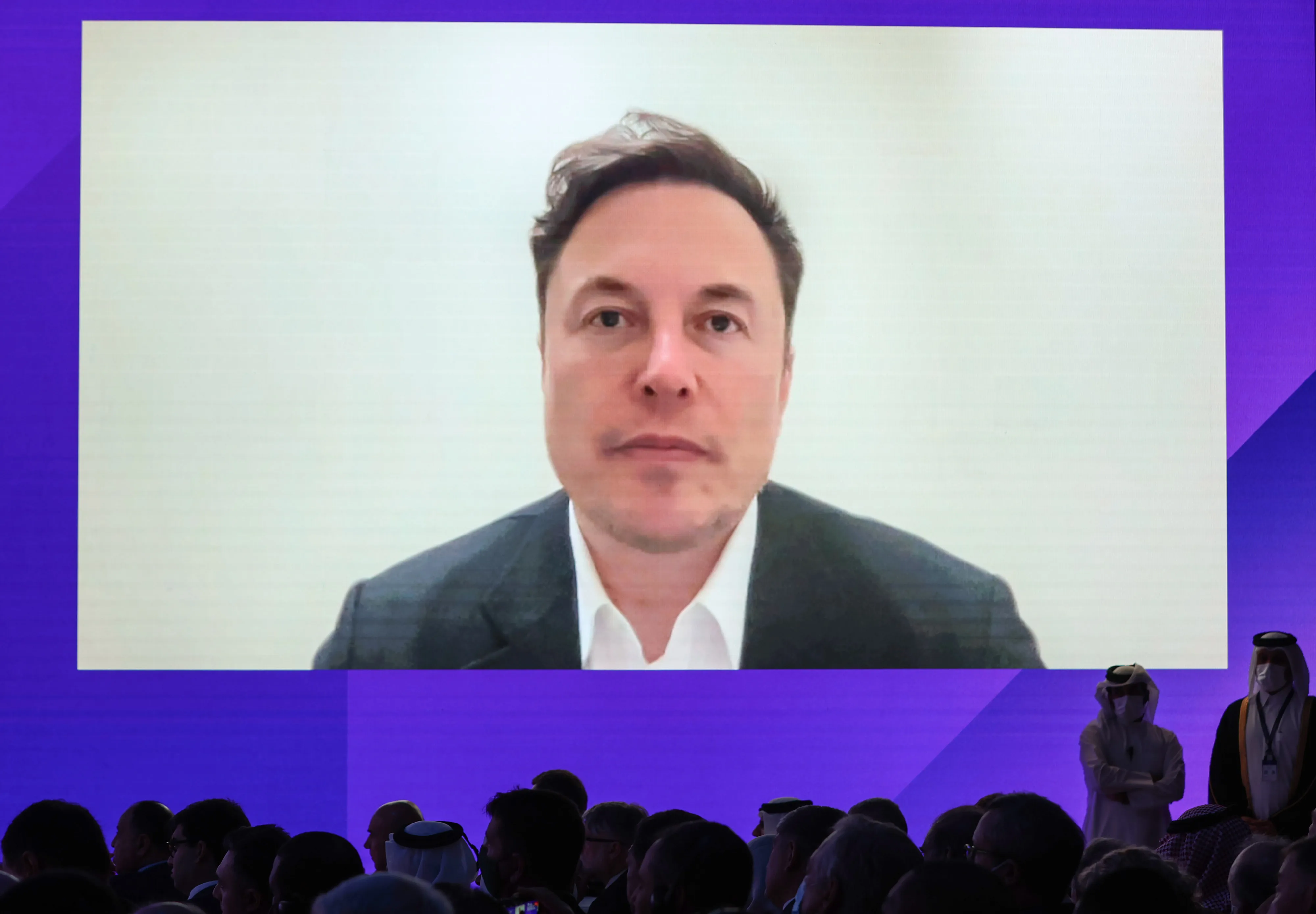 Elon Musk speaks via video link during the Qatar Economic Forum in Doha, on June 21.