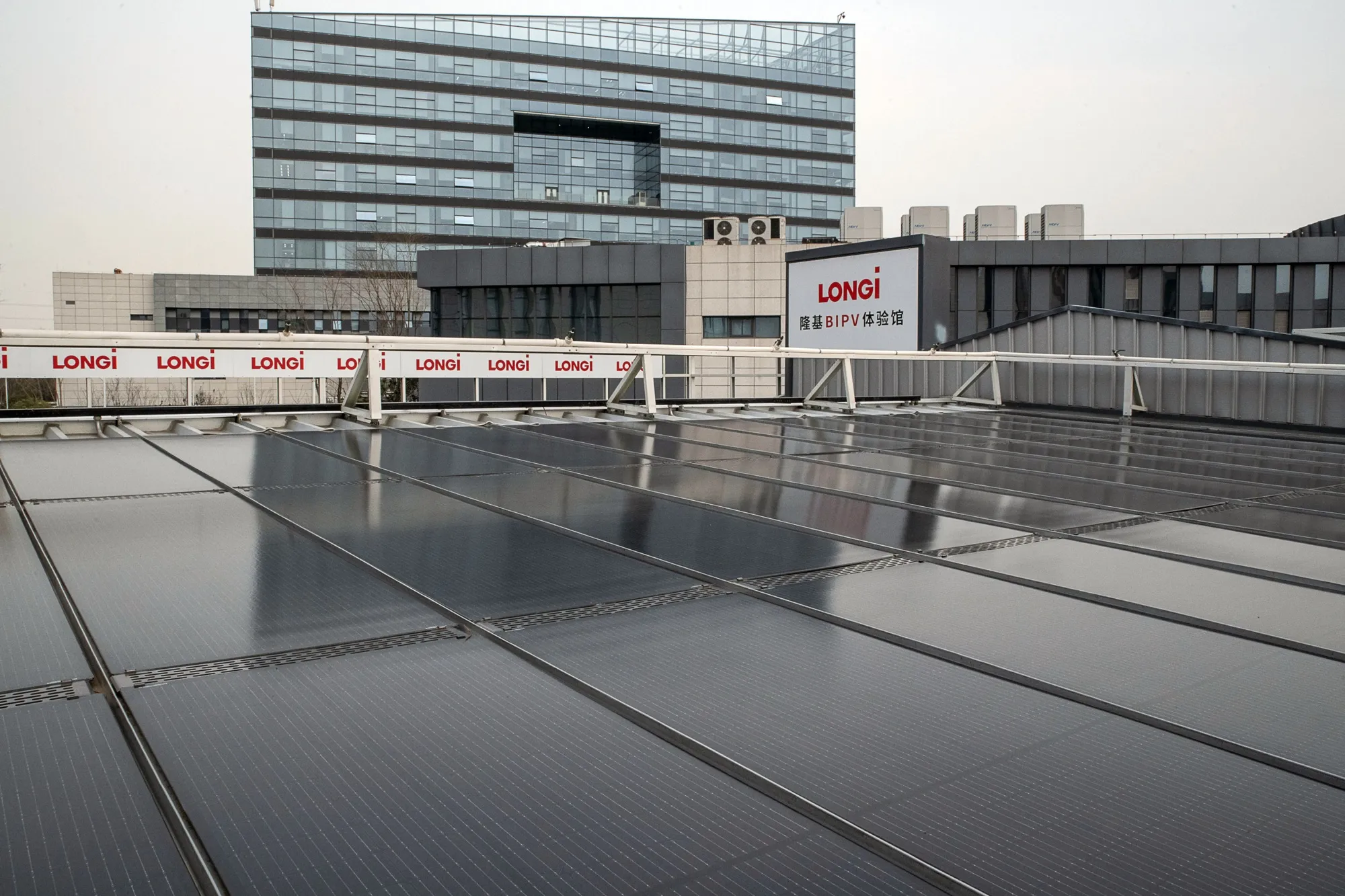 Longi Green Energy Technology Co. solar panels on the rooftop of the company's headquarters in Xi'an, China.