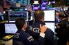 Traders work during the Slack Technologies Inc. initial public offering (IPO) on the floor of the New York Stock Exchange (NYSE) in New York, U.S., on Thursday, June 20, 2019. Following in the footsteps of music-streaming service Spotify Technology SA last year, the workplace messaging application is set to start trading on the New York Stock Exchange Thursday via a direct listing.