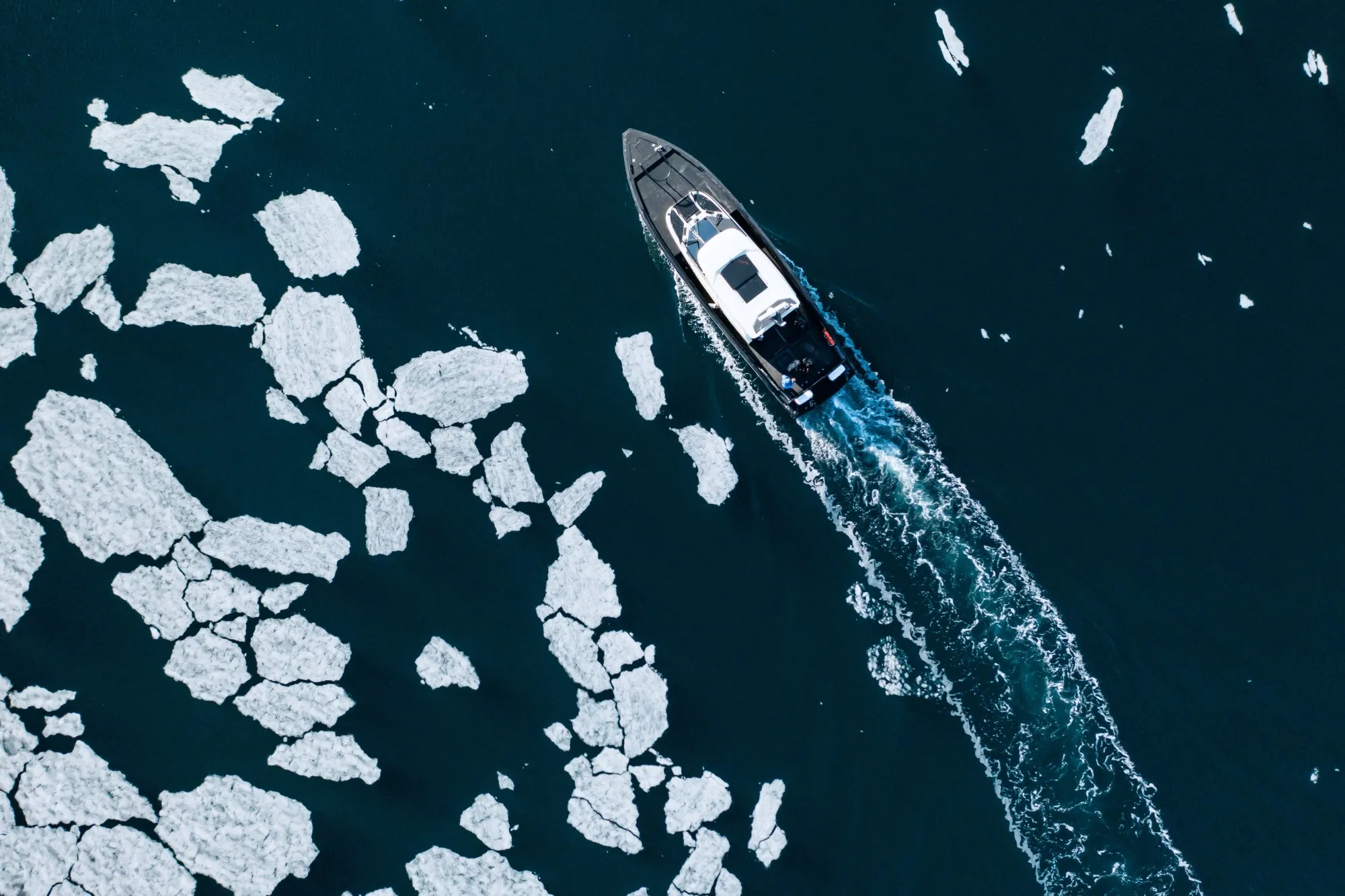 A boat in the sea ice in the Borebukta Bay, in northern Norway.
