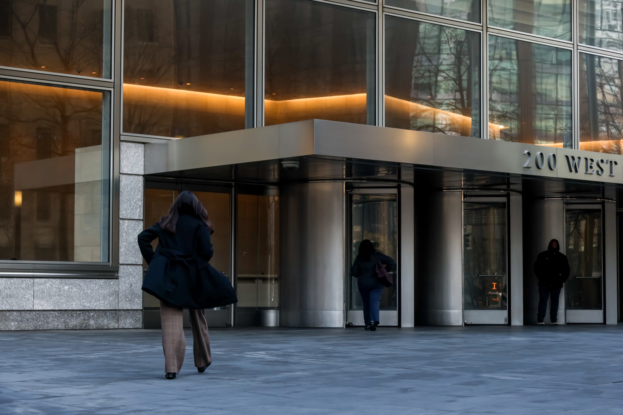 Pedestrians outside the Goldman Sachs headquarters in New York.