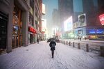 Snowfall blankets Times Square in New York City, on Jan.&nbsp;29.
