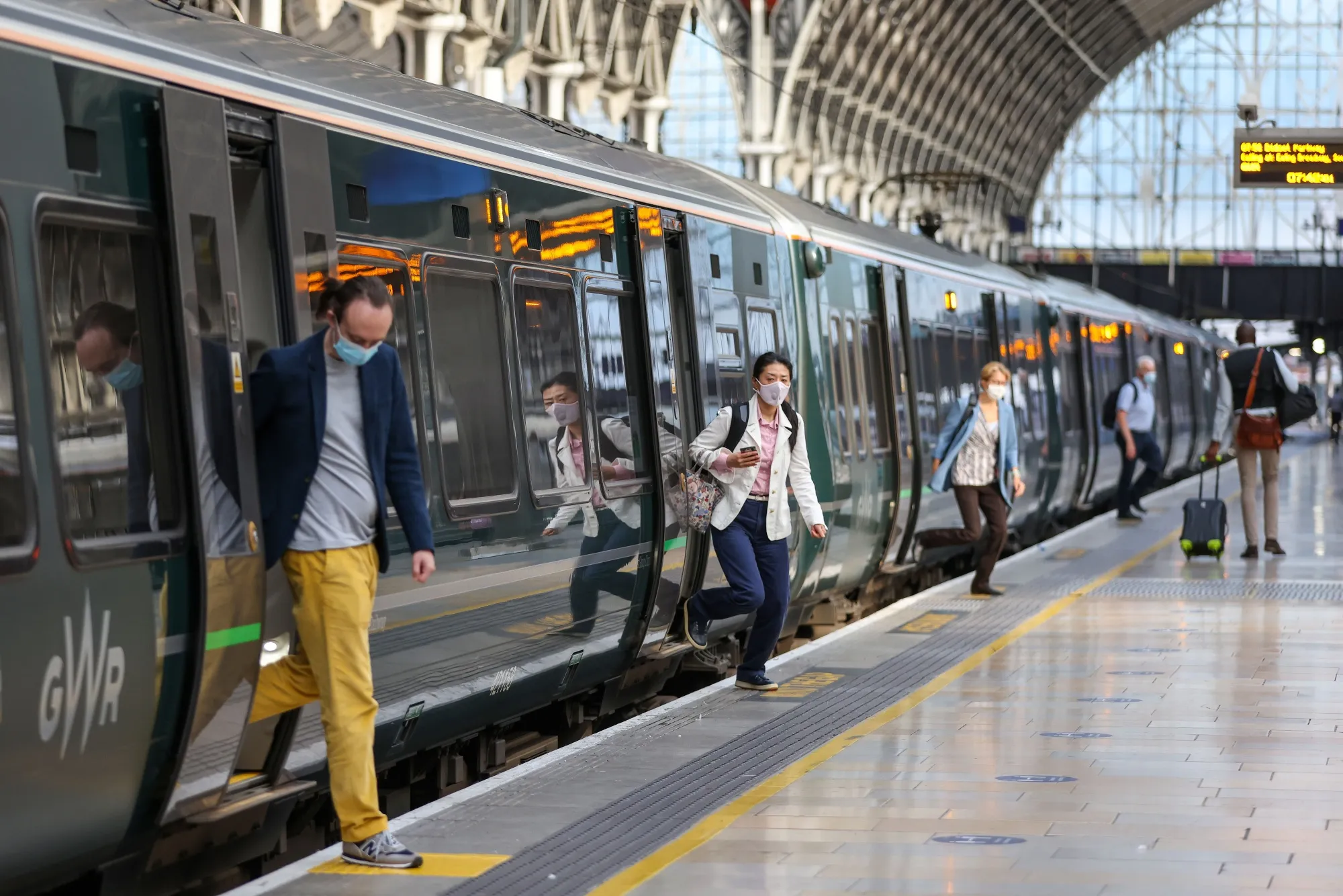 Commuters at London Paddington railway station.