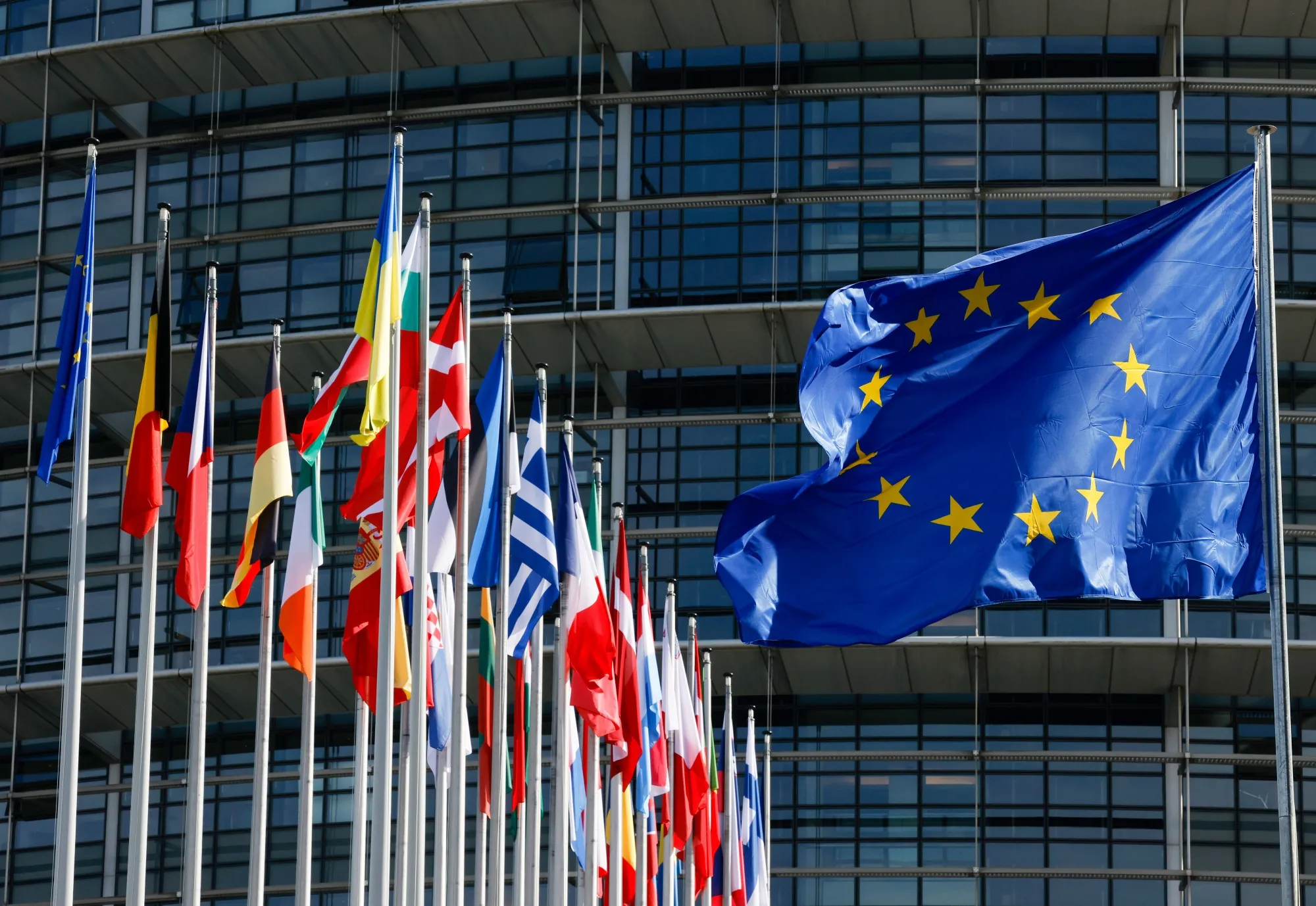 The flags of the European Union&nbsp;and member countries at the European Parliament's Louise Weiss building in Strasbourg, France on&nbsp;Sept. 12, 2023.
