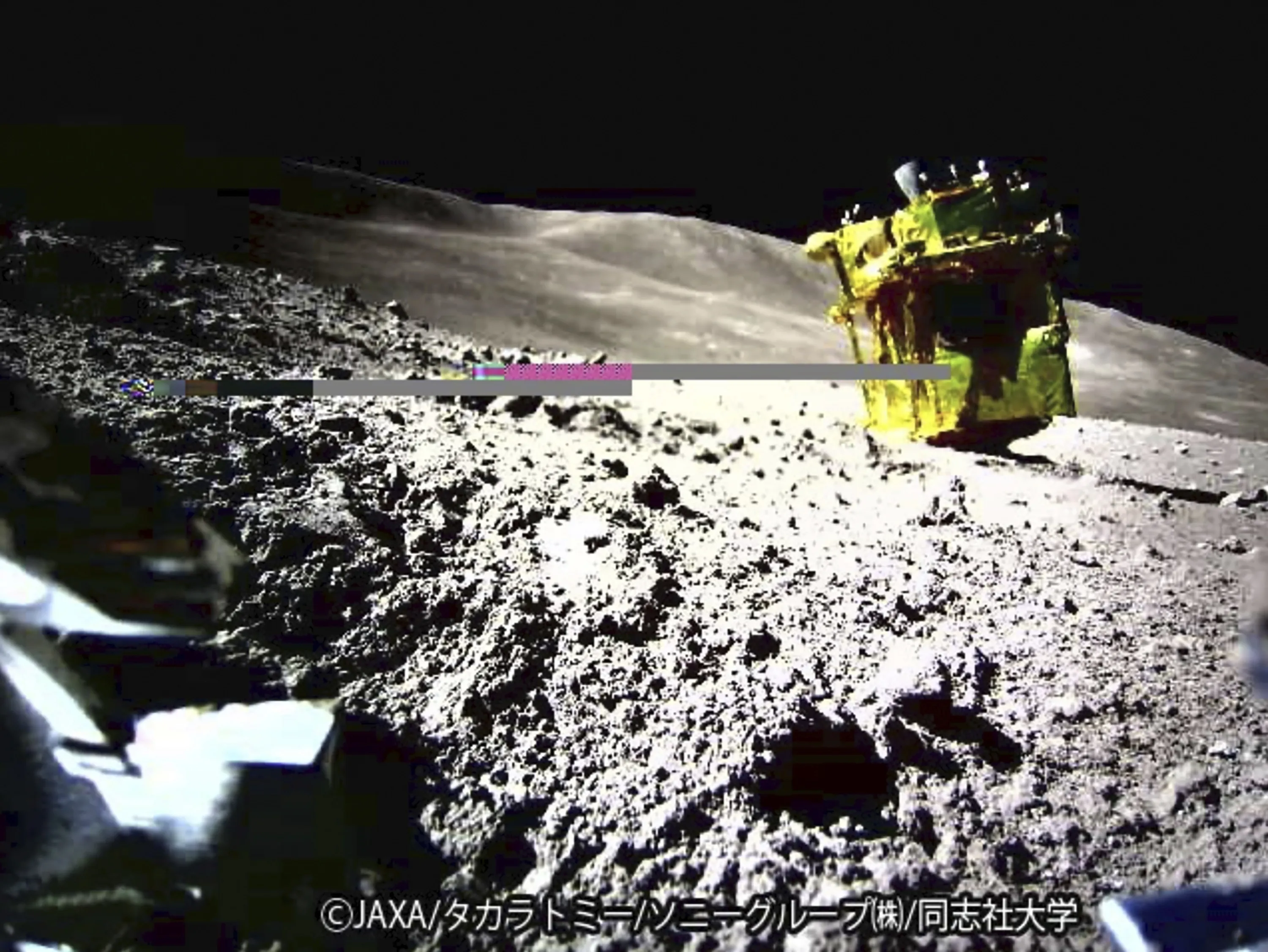 An image taken by a Lunar Excursion Vehicle 2 (LEV-2) of a robotic moon rover called Smart Lander for Investigating Moon, or SLIM, on the moon.&nbsp;