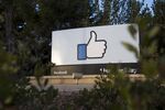 Signage is displayed outside Facebook Inc. headquarters in Menlo Park, California.