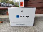 The logo for Labcorp on a specimen collection box.