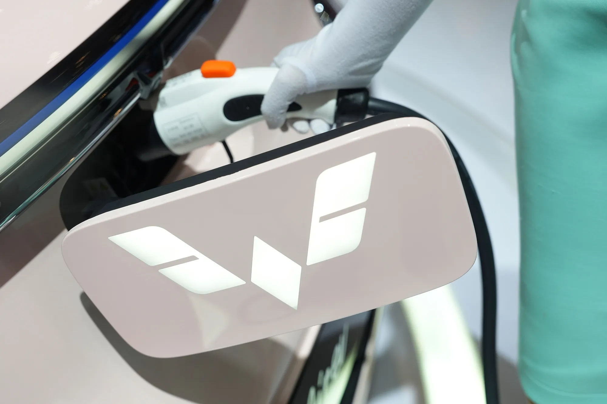 A Wuling Air electric vehicle being charged at the Gaikindo Indonesia International Auto Show in August.
