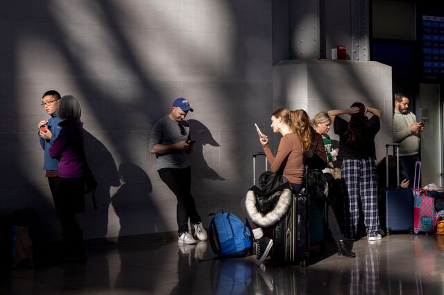 Commuters in Moynihan Train Hall as Amtrak railway service across the Northeast Corridor faced delays and cancellations ahead of the holidays at Penn Station in New York, on Dec. 23, 2024. 