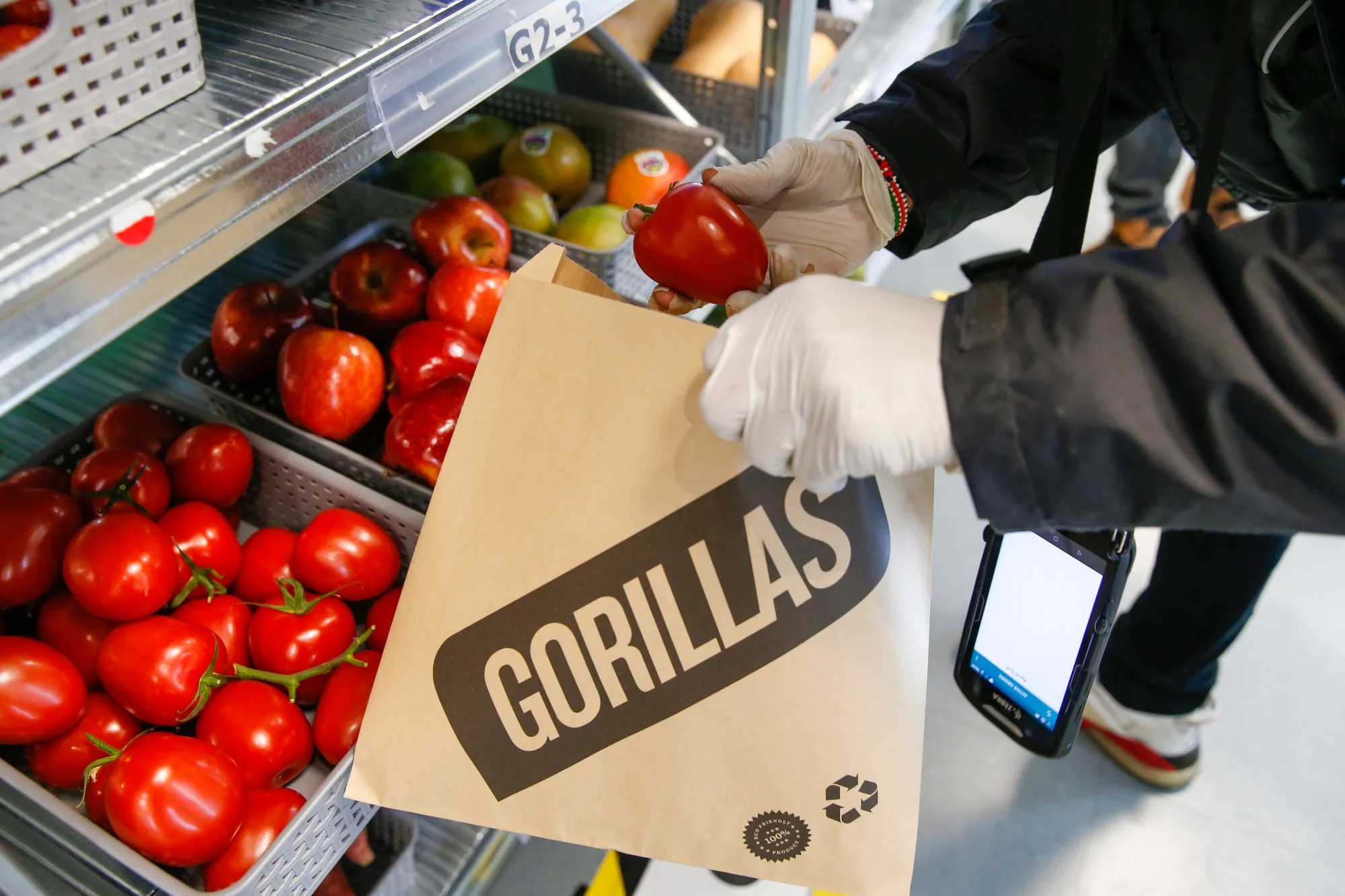 A worker fulfills orders at a Gorilla Technologies “dark store” in Shoreditch in London.