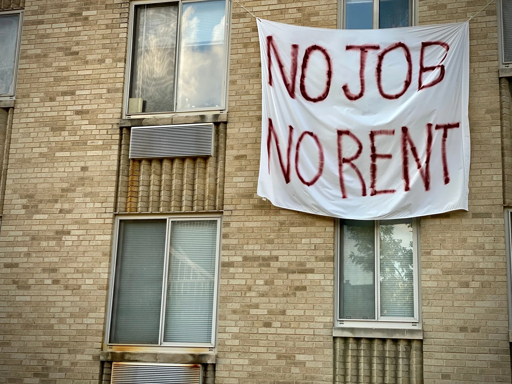 A banner against eviction in Washington, DC., in August.&nbsp;