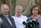 Attorney Thomas Girardi, left, smiles with David Stow, and his wife Ann, the parents of San Francisco Giants fan Brian Stow, outside the Los Angeles courthouse on Wednesday, July 9, 2014. A Los Angeles jury returned to court to resume deliberations Thursday, in a negligence lawsuit filed by Bryan Stow against the Dodgers and former owner Frank McCourt. Stow suffered severe brain damage in a beating at Dodger Stadium. (AP Photo/Damian Dovarganes)