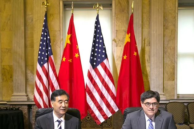 Wang Yang, China's vice premier, left, and Jacob "Jack" Lew, U.S. treasury secretary, attend a chief executive officer roundtable with U.S. and Chinese business leaders on July 11