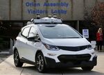 A Chevrolet Bolt with self-driving technology outside of the General Motors Orion Assembly Plant in Orion Township, Michigan.